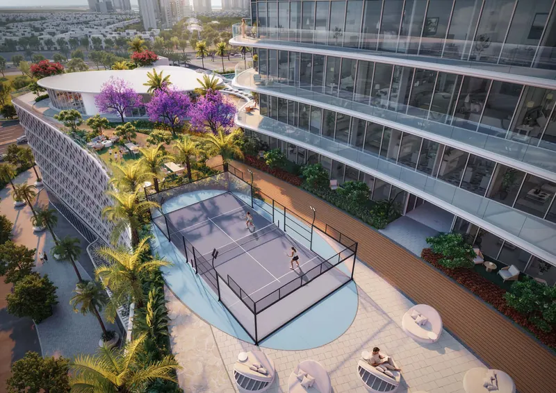Padel court on the podium, framed by gardens